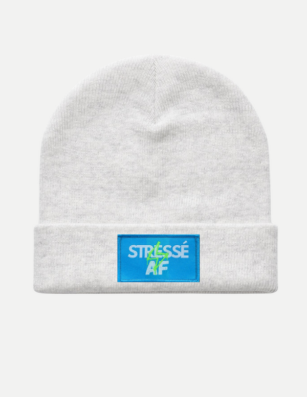 Unlearn hat. Stresse collective brand. mental health apparel.