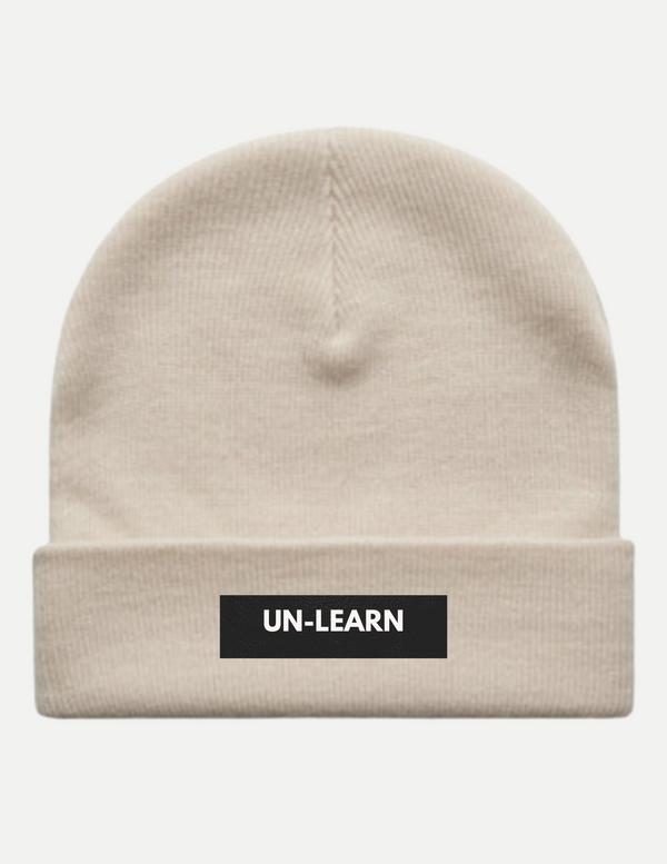 Unlearn hat. Stresse collective brand. mental health apparel.