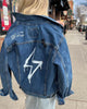 Levi Jacket. Trucker jacket with unlearn patch. stresse collective brand. mental health apparel with lightning bolt